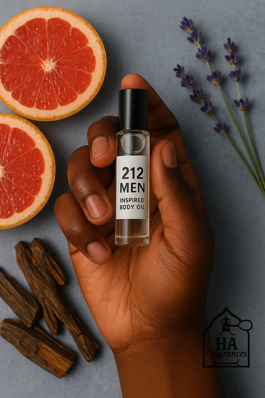 Dark-skinned hand holding HA Fragrances 212 MEN inspired body oil roll-on bottle, surrounded by grapefruit slices, lavender sprigs, and sandalwood sticks – fresh citrus and warm musk scent for men.