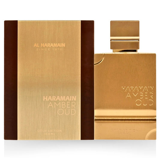 Al Haramain Amber Oud Gold Edition EDP 100ML with its luxurious golden packaging, showcasing a sleek and elegant design.