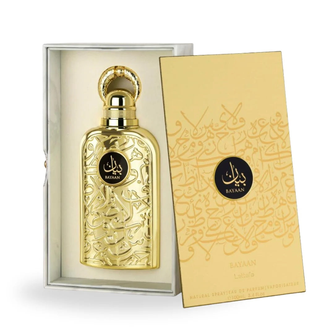 The Bayaan Eau De Parfum by Lattafa displayed with its luxurious gold packaging and ornate bottle, featuring intricate Arabic calligraphy and an opulent design.