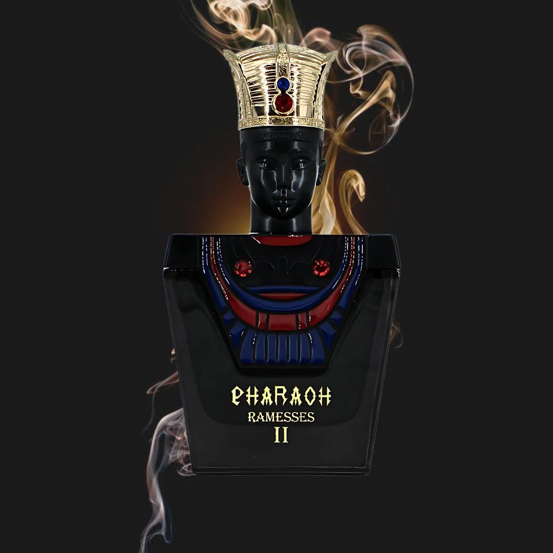 Pharaoh Ramesses II Eau De Parfum 100ML – a luxurious black and gold fragrance bottle with a pharaoh-inspired design, surrounded by smoky accents, representing its deep and smoky scent profile.
