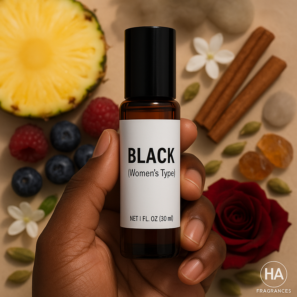 A bottle of Black (Women’s Type) Body Oil held by a dark-skinned hand, surrounded by cinnamon sticks, jasmine and rose petals, sandalwood pieces, and amber stones, with the HA Fragrances logo in the corner.