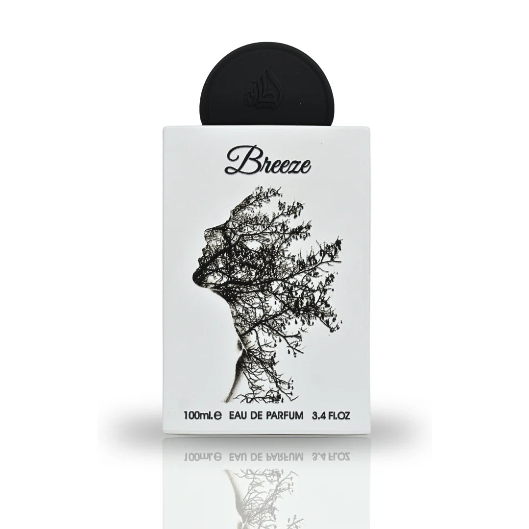 A close-up view of the Breeze Eau De Parfum bottle by Lattafa Pride, featuring an artistic design of a silhouette intertwined with branches on a sleek white surface.