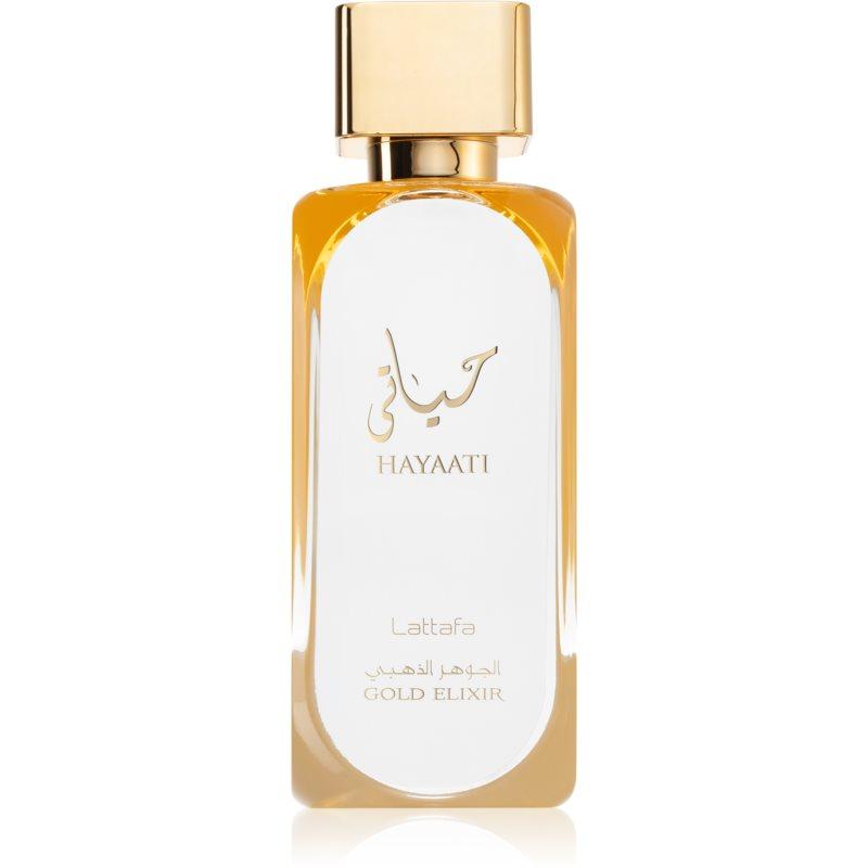 Hayaati Gold Elixir Eau de Parfum 3.4oz by Lattafa, featuring a sleek transparent gold bottle with elegant white and gold detailing.