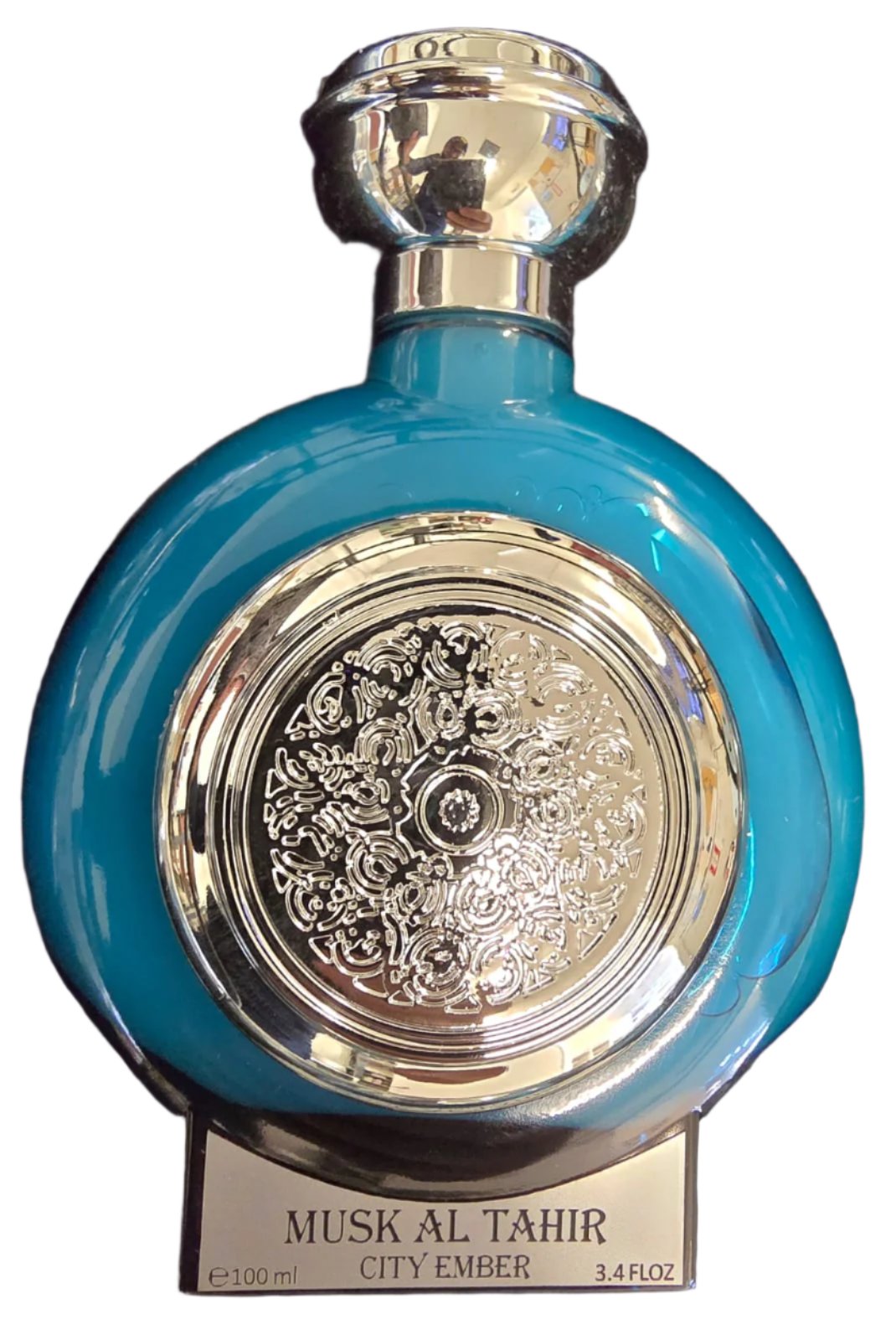 A luxurious blue Musk Al Tahir perfume bottle by City Ember with ornate silver detailing, 100ml Eau De Parfum.