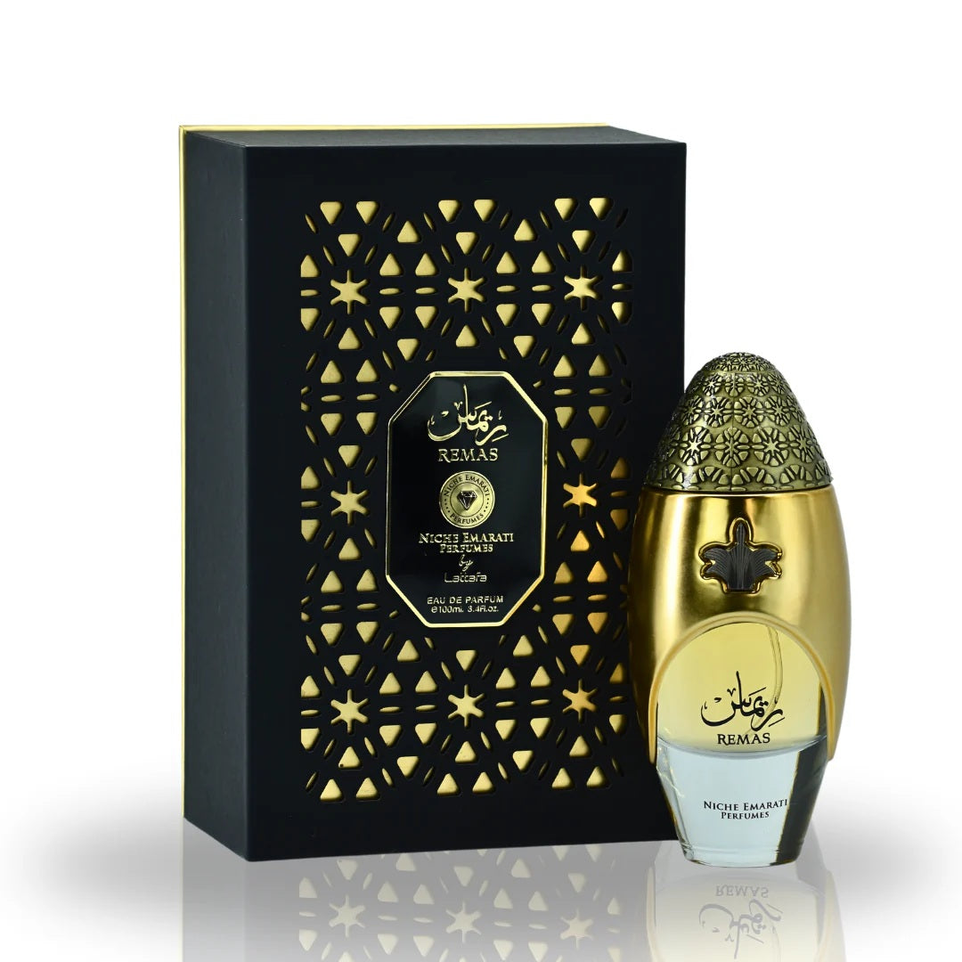 The Remas Eau De Parfum by Lattafa displayed with its exquisite black and gold packaging, featuring intricate cut-out designs and a sophisticated golden bottle.