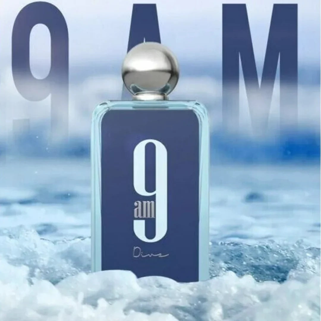 Afnan 9AM Dive Perfume bottle showcased amidst refreshing aquatic waves, reflecting its fresh and invigorating scent.