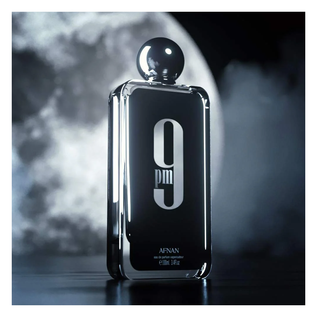 Afnan 9pm Perfume highlighted under the moonlight - Sophisticated evening fragrance.