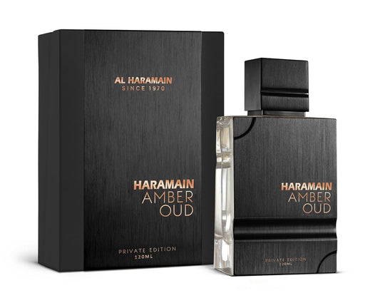 Al Haramain Amber Oud Private Edition EDP 120ML bottle displayed alongside its elegant black and copper box packaging, a premium unisex fragrance for sophisticated tastes.