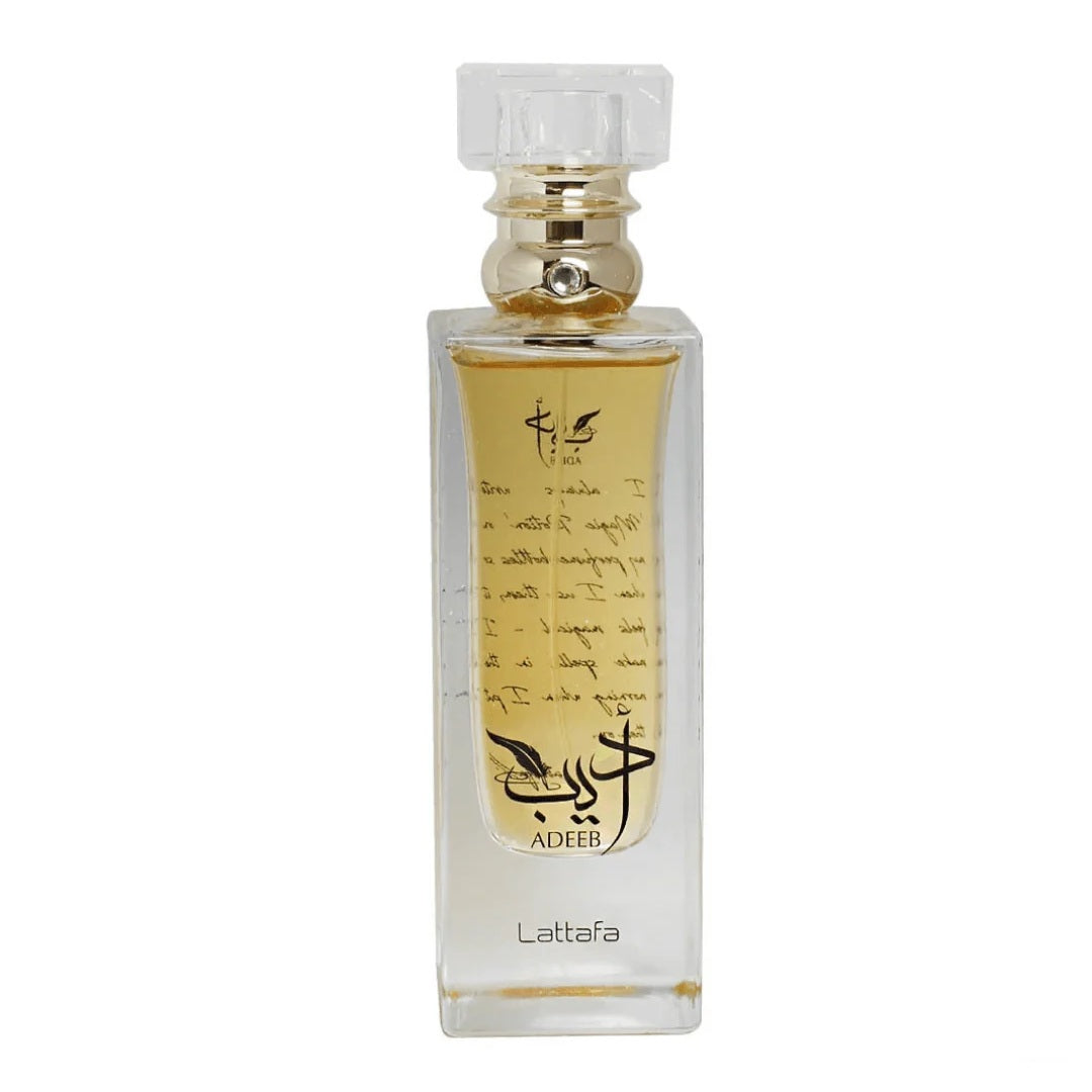 Adeeb EDP 80ML by Lattafa – Stylish transparent glass perfume bottle with gold detailing, featuring a sophisticated and artistic inscription.