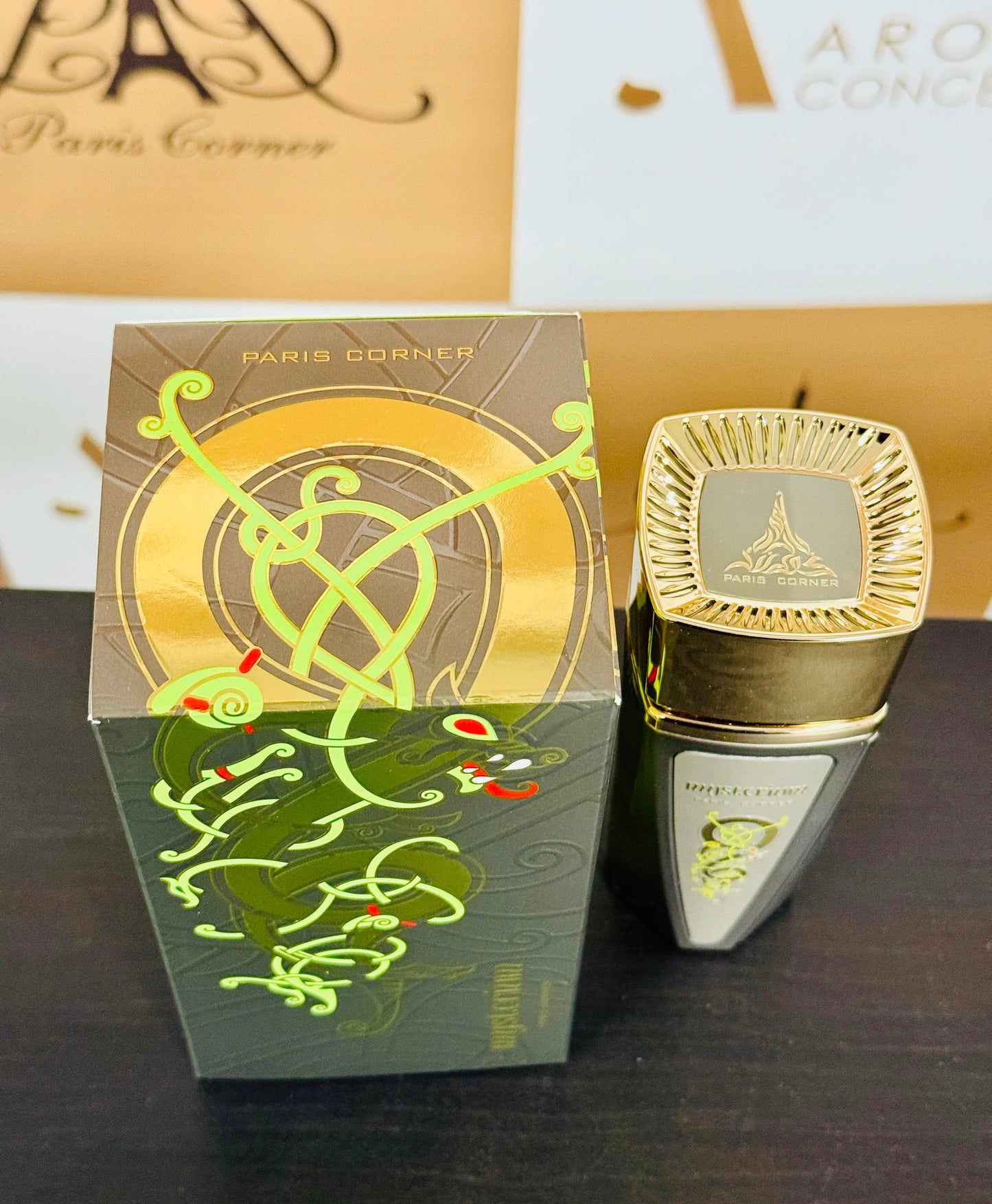 Top view of Mysterium by Paris Corner fragrance box and cap featuring intricate gold dragon artwork and branding.