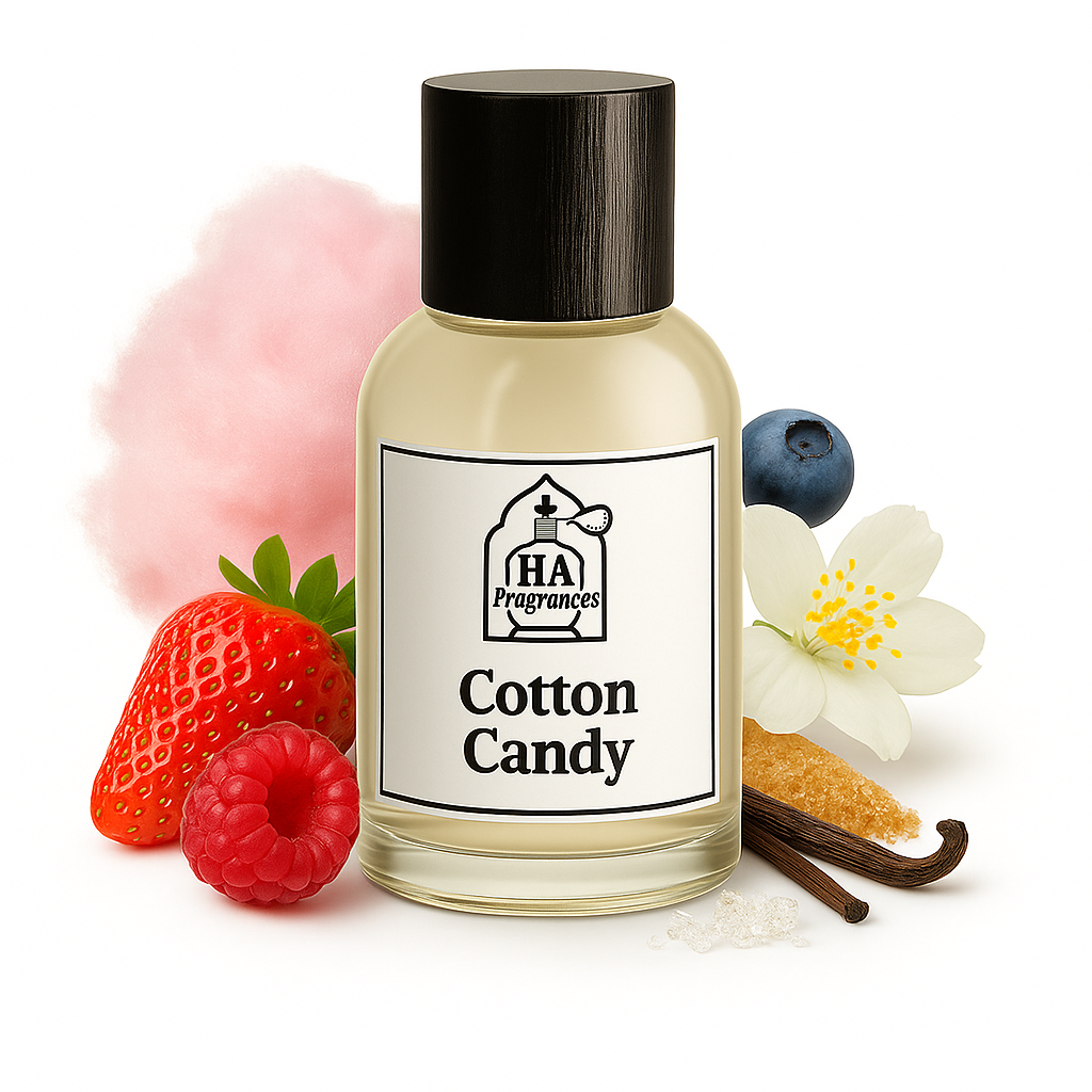 Cotton Candy perfume oil by HA Fragrances in a glass bottle with pink cotton candy, strawberry, raspberry, blueberry, vanilla bean, and sugar crystals on a white background.