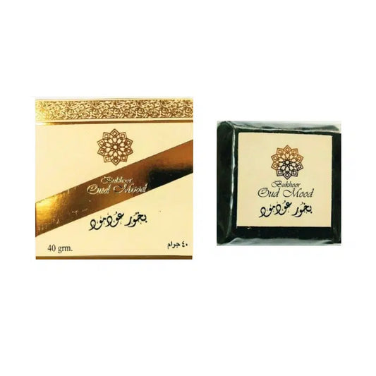 Oud Mood Bakhoor by Ard Al Zaafaran, a premium 40g Arabian incense with a captivating oud fragrance, presented in elegant gold and white packaging.