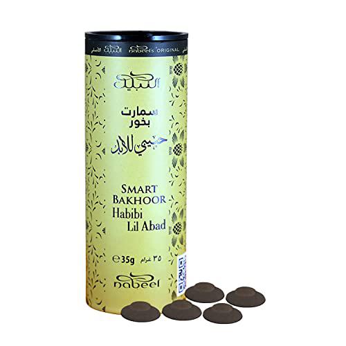Image of Al Nabeel Smart Bakhoor Habibi Lil Abad, a premium 35g home fragrance with a sleek yellow cylindrical packaging and black bakhoor pieces displayed in front.