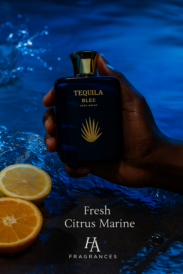 Dark-skinned hand holding Bharara Tequila Bleu Eau De Parfum bottle with ocean-blue background, citrus fruits, and marine water splashes, featuring HA Fragrances logo and text overlay ‘Fresh Citrus Marine’.