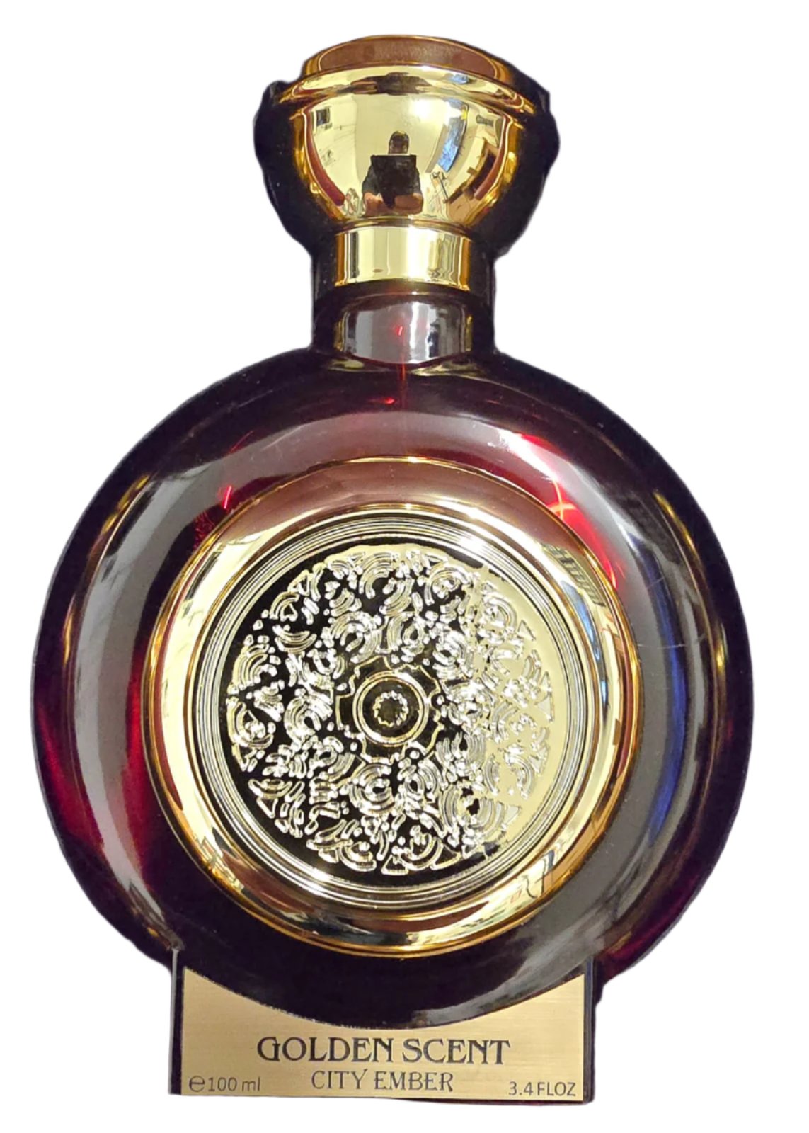 Elegant Golden Scent Perfume Bottle by City Ember, adorned with golden ornate patterns and a luxurious round design.