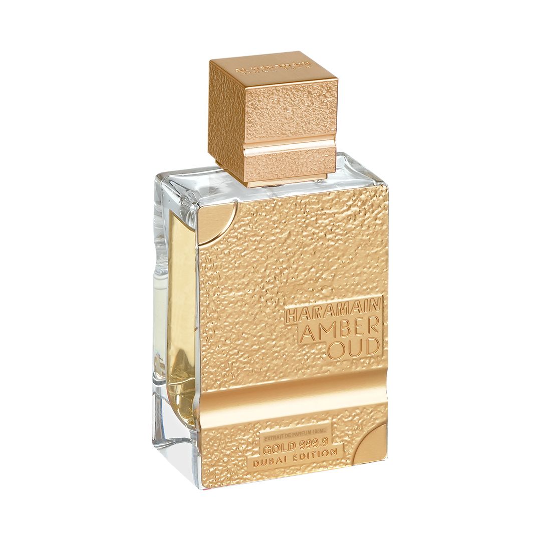 A close-up of the Haramain Amber Oud Gold 999.9 Dubai Edition Extrait De Parfum, 100ml, showcasing its intricate gold design and premium craftsmanship.
