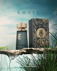 KHair Eau de Parfum by Paris Corner displayed against a natural backdrop with flowing water and lush greenery.