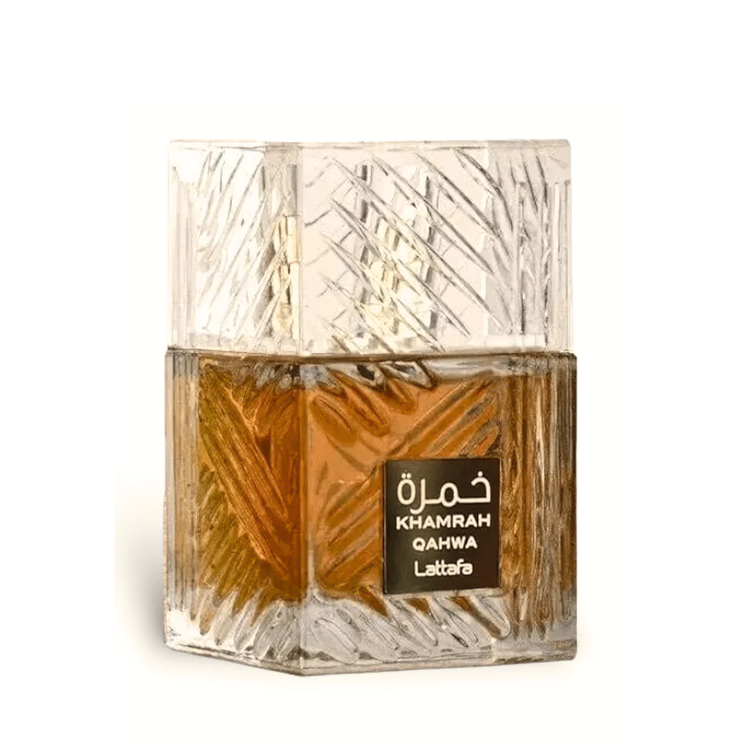 Khamrah Qahwa Eau de Parfum 100ML by Lattafa, featuring a luxurious glass bottle with intricate geometric design and warm amber tones.