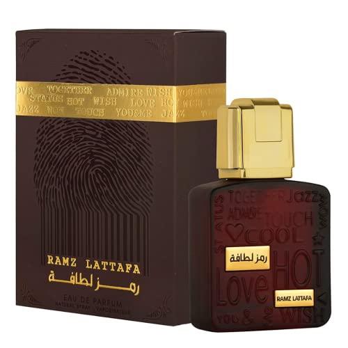 Lattafa Ramz Gold Eau de Parfum 3.4oz, featuring a luxurious dark brown and gold bottle with matching elegant packaging, showcasing intricate embossed details.