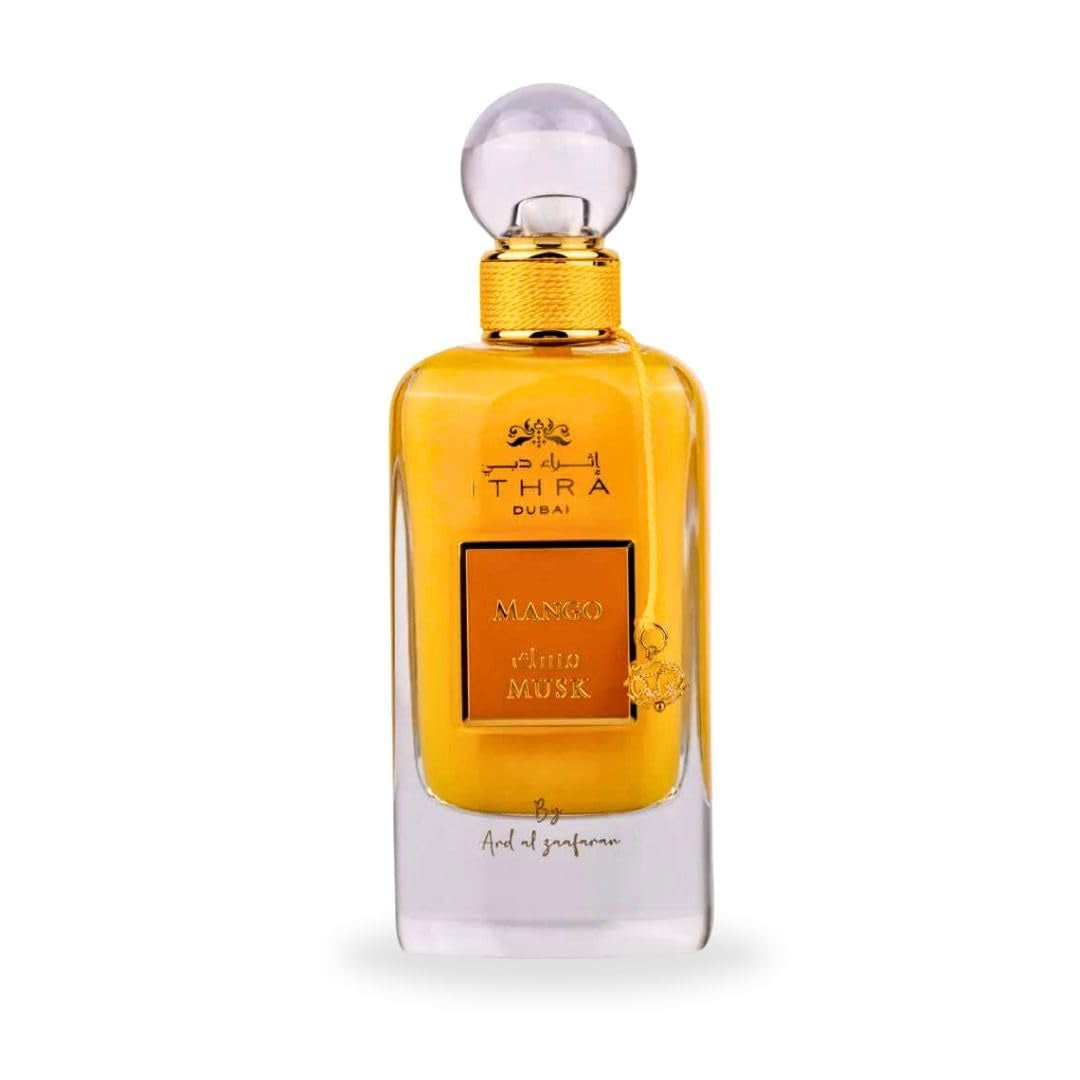 A luxurious Mango Musk EDP perfume bottle from the Ithra Dubai Collection by Ard Al Zaafaran, featuring a golden hue and elegant design.