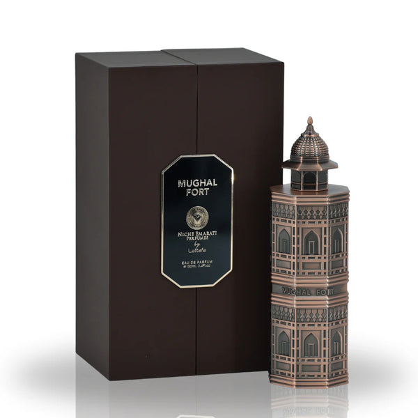 The Mughal Fort Eau De Parfum by Lattafa displayed with its elegant packaging, showcasing a luxurious bronze architectural bottle and sophisticated black box.