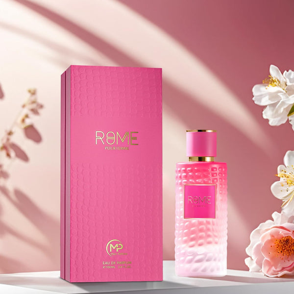 Rome Pour Femme Eau De Parfum 100ML – a luxurious pink perfume bottle next to its matching textured pink packaging, reflecting elegance and femininity.