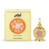 Amaali concentrated perfume oil by Swiss Arabian displayed with its elegant floral-themed golden and peach packaging.