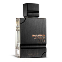 Close-up of Al Haramain Amber Oud Private Edition EDP 120ML bottle, showcasing its sleek black design with copper accents, representing a luxurious unisex fragrance.