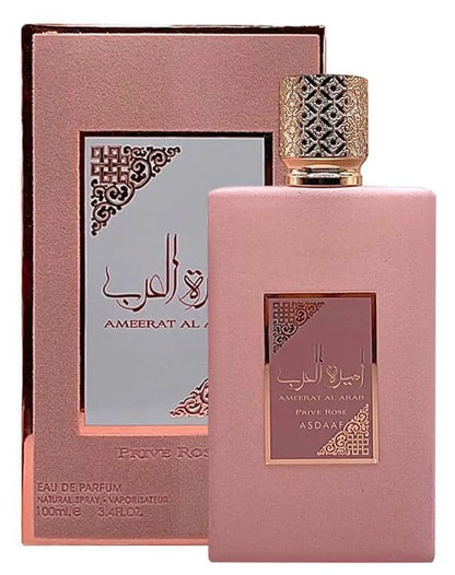 Ameerat Al Arab Prive Rose EDP 100ml perfume bottle alongside its elegant pink and gold packaging.