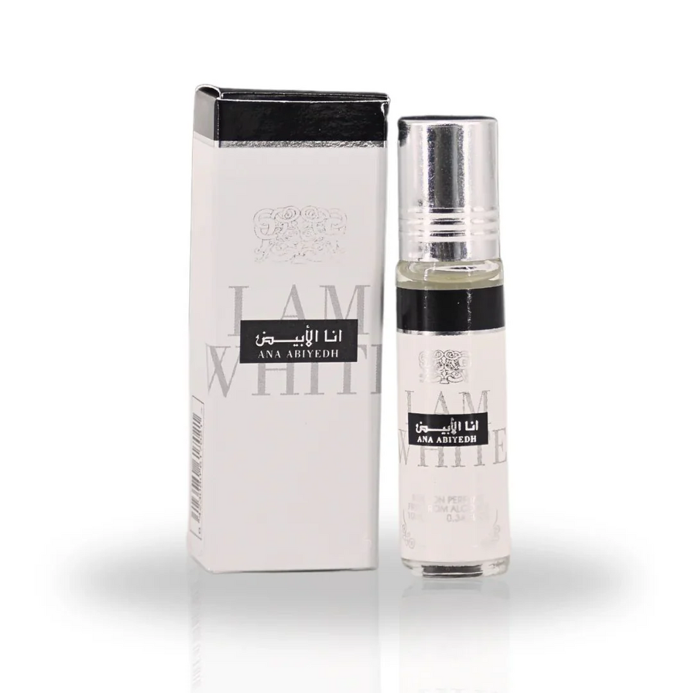 Ana Abiyedh Roll-On Perfume Oil 10ML by Ard Al Zaafaran, featuring a sleek bottle and matching elegant white and black packaging.