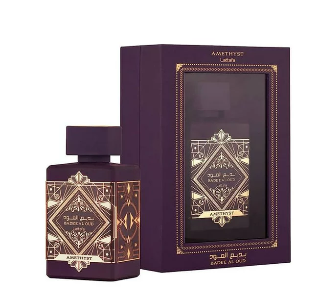 Badee Al Oud Amethyst by Lattafa - 100ml unisex fragrance in a sophisticated purple bottle with intricate gold detailing and matching premium packaging.