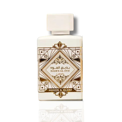 Bade’e Al Oud Honor & Glory Eau De Parfum by Lattafa, showcasing a sleek white bottle adorned with gold geometric patterns and elegant accents.