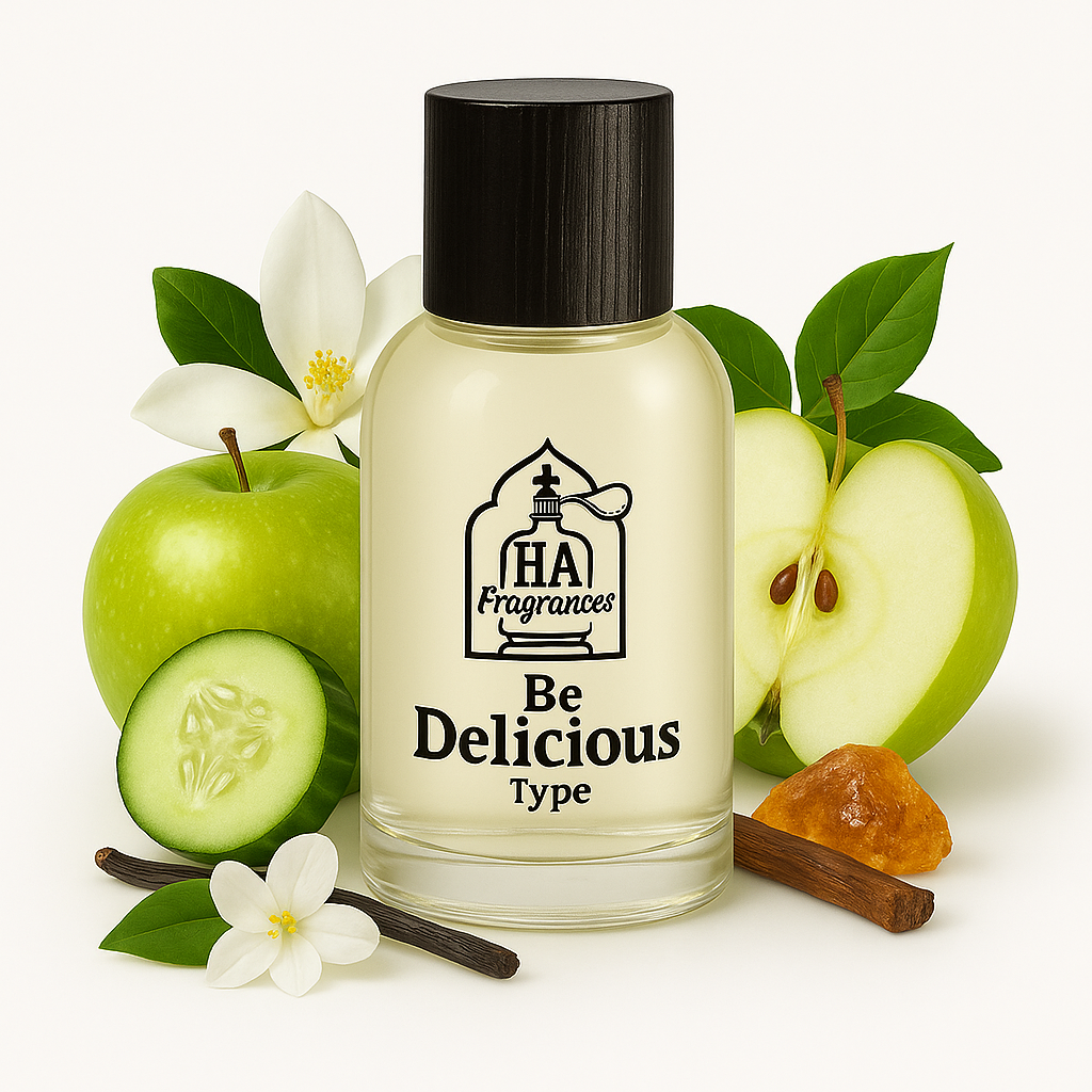 Be Delicious Women Type perfume oil by HA Fragrances in a clear bottle with light green liquid, surrounded by green apple slices, cucumber slices, magnolia flowers, and amber resin on a white background.