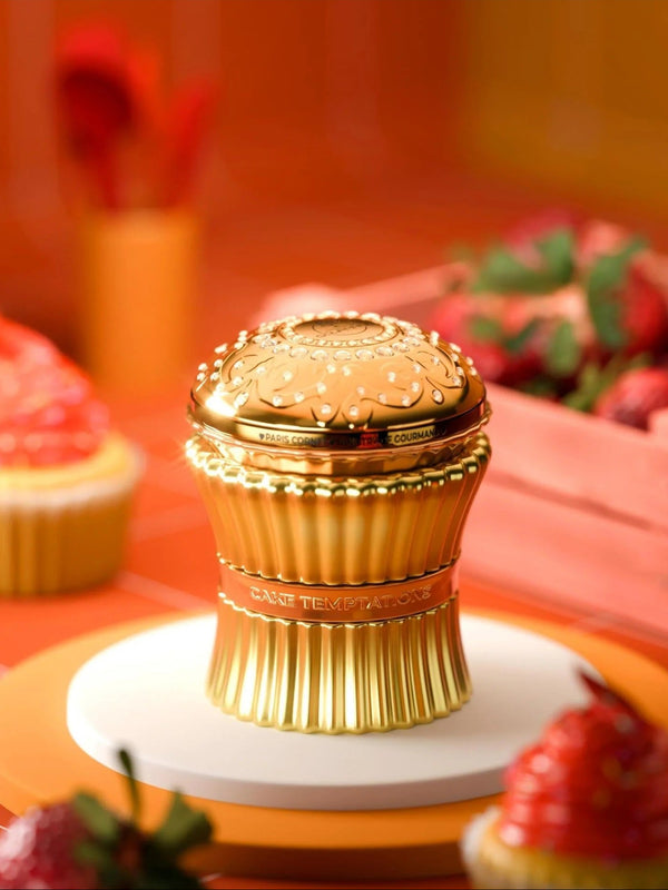 Cake Temptations by Paris Corner – gourmand fragrance bottle styled with strawberries and cupcakes