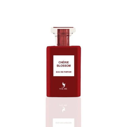 Cherie Blossom Eau De Parfum 100ml by Volare, showcasing a sleek red bottle with a modern design and clear cap, embodying its floral and fruity fragrance.