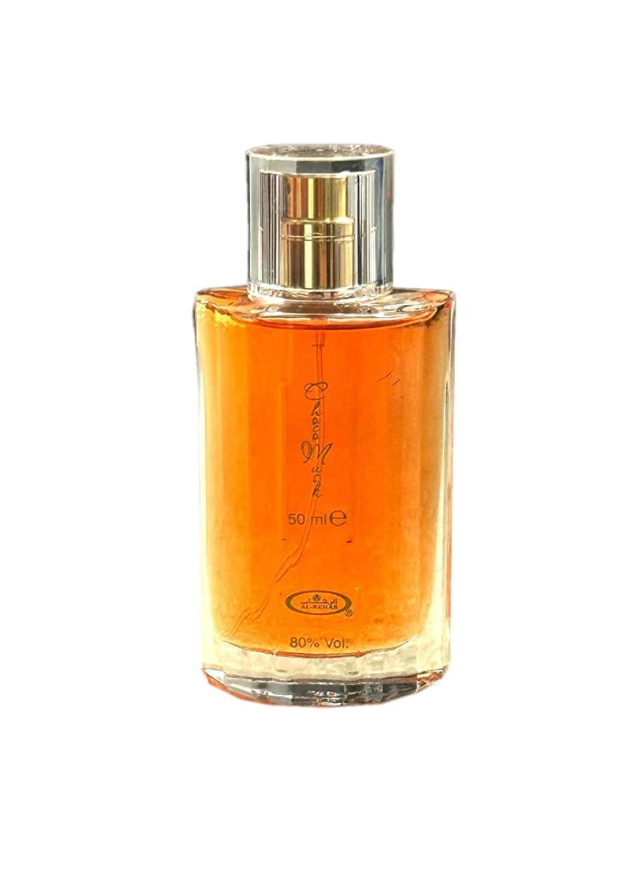 Choco Musk Eau De Parfum 50ml by Al-Rehab, featuring a sleek glass bottle filled with warm amber-colored fragrance, perfect for a sweet and oriental scent experience.