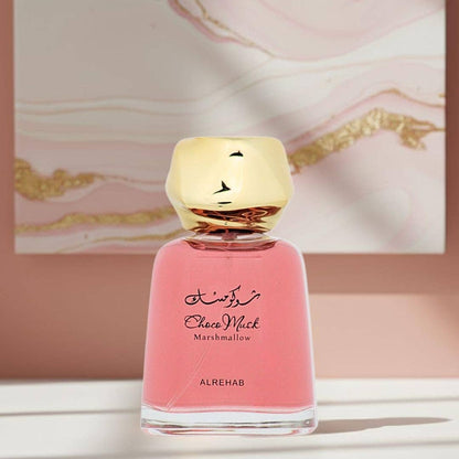 Choco Musk Marshmallow by Al Rehab perfume bottle on pink marble background
