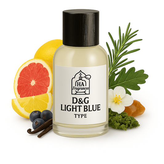 D&G Light Blue Men Type cologne oil by HA Fragrances in a clear bottle, surrounded by grapefruit, lemon, juniper berries, rosemary sprigs, oakmoss, vanilla bean, and white floral on a white background.