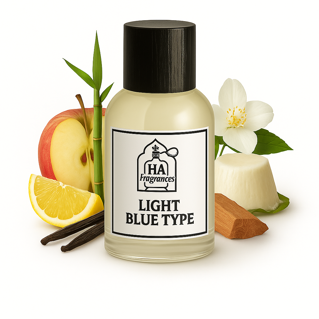 D&G Light Blue Women Type perfume oil by HA Fragrances in a clear bottle, surrounded by red apple slices, lemon wedge, bamboo stalk, jasmine flower, cedarwood, and vanilla bean on a white background.