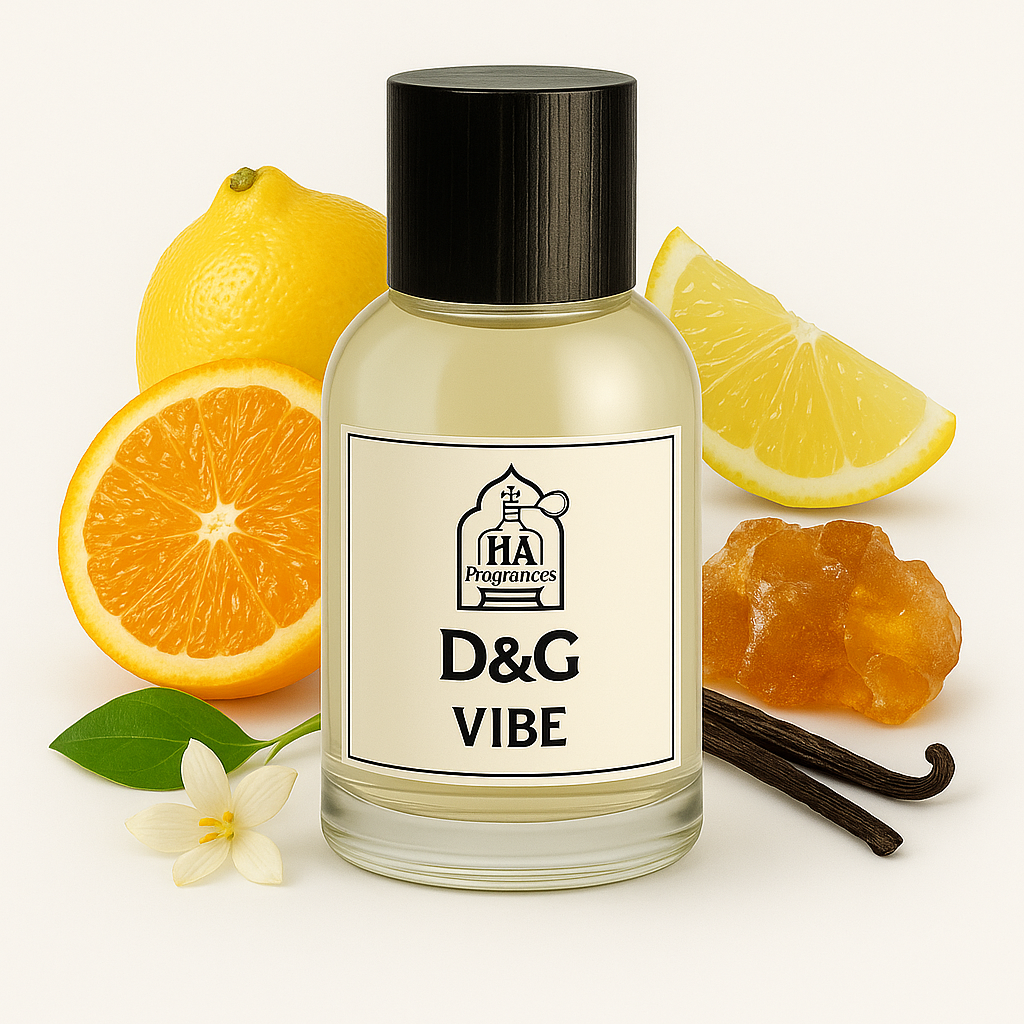 D&G Vibe Type perfume oil by HA Fragrances in a clear glass bottle, surrounded by orange slices, lemon wedges, amber resin, vanilla bean, and white floral on a white background.