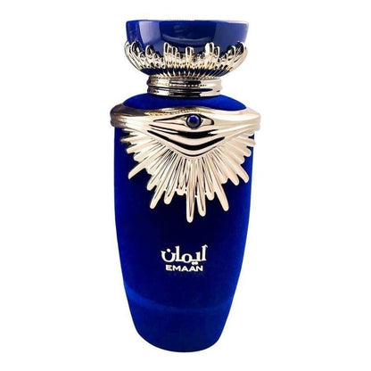 Emaan Eau De Parfum by Lattafa, showcasing a stunning royal blue velvet bottle adorned with an ornate gold design for a sophisticated touch.