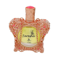 Close-up of Farasha 28ml perfume oil by Khadlaj in a stunning rose gold ornamental bottle with intricate patterns and jewel accents.