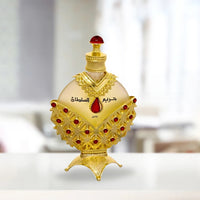 Hareem Al Sultan Gold Perfume Oil by Khadlaj, 35ML, featuring a luxurious gold bottle with intricate red and gold embellishments.