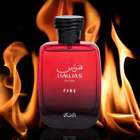 Hawas Fire for Him Eau De Parfum by Rasasi – A bold and fiery men's fragrance, captured with a red bottle against burning flames.