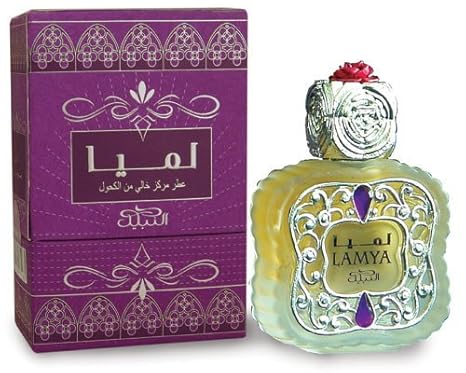 Lamya Concentrated Perfume Oil by Nabeel, presented in a luxurious bottle with intricate silver floral detailing and vibrant purple stone embellishments, alongside a matching purple box.