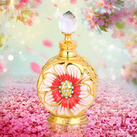 Layali Rouge perfume bottle by Swiss Arabian elegantly displayed amidst a floral backdrop, capturing its luxurious design and captivating fragrance essence.