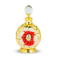 Layali Rouge perfume bottle by Swiss Arabian, featuring an exquisite golden design with a red and white floral motif, crowned with a crystal cap.
