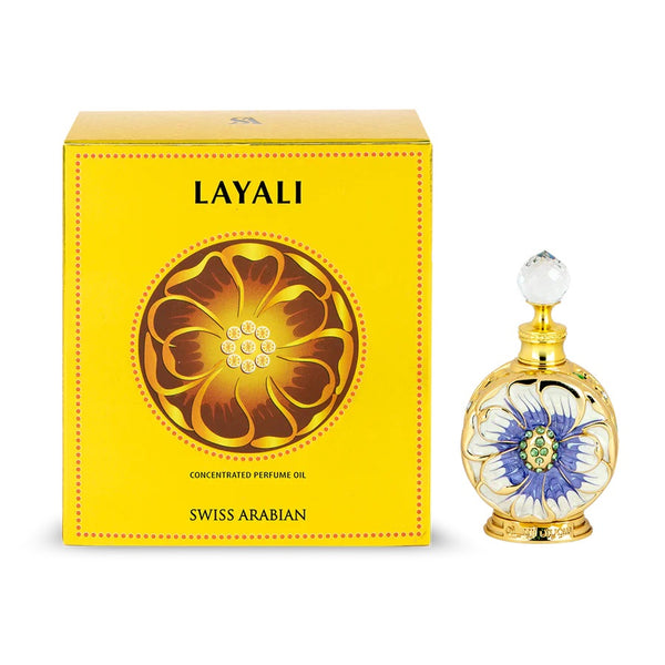 Layali concentrated perfume oil by Swiss Arabian displayed with its vibrant yellow packaging and intricately designed floral-themed bottle.