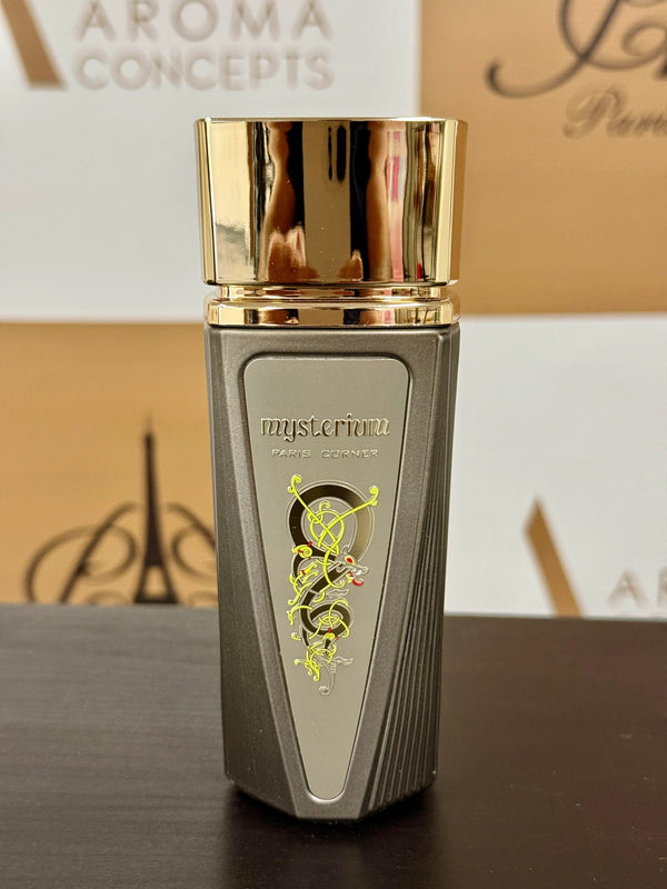 Close-up of Mysterium Eau de Parfum by Paris Corner – unisex citrus summer fragrance in a sleek metallic bottle with gold cap.