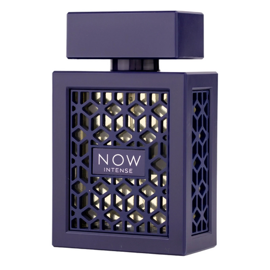 Close-up of Now Intense Eau De Parfum bottle by RAVE, showcasing its intricate geometric design and deep blue finish.